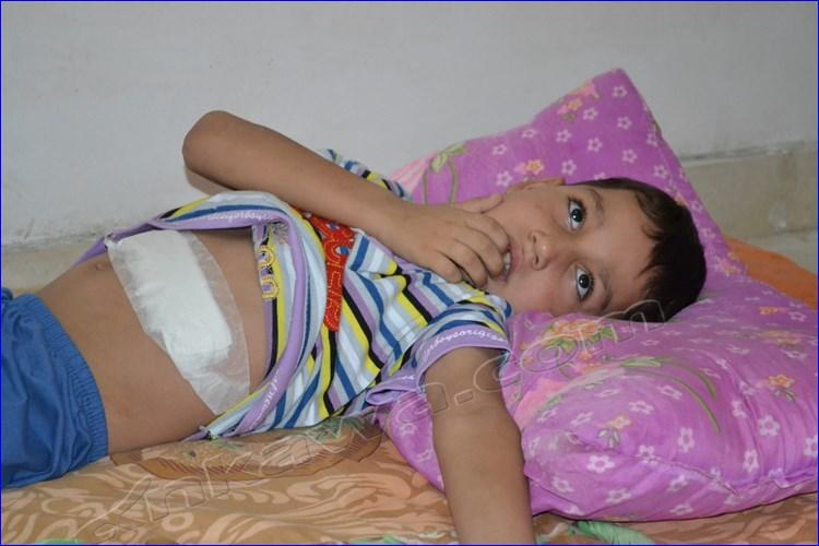 An Assyrian child in need of medical attention.