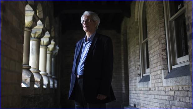 Amir Harrak, professor of Syriac and Aramaic languages at the University of Toronto, poses for a photo in Toronto on Aug. 8, 2014. Mr. Harrak has been working to preserve rare inscriptions written in the ancient language of Syriac and the university has the world's largest photograph collection of Syriac inscriptions from Iraq (photo: Michelle Siu).