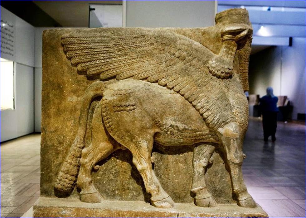 An Assyrian winged bull made out of limestone displayed at the Iraqi National Museum in Baghdad
