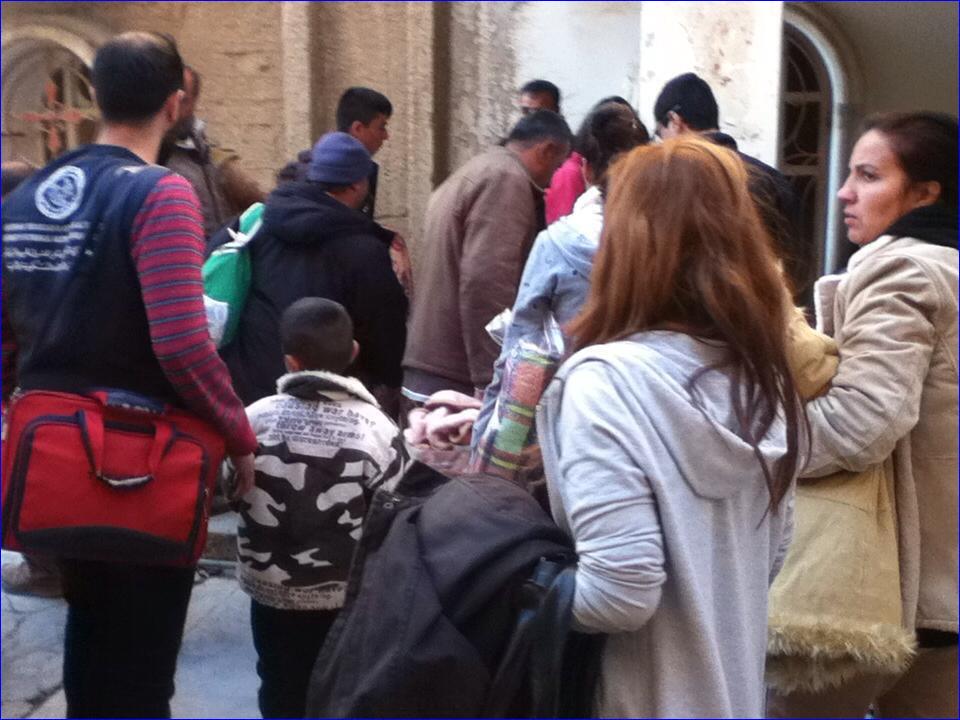 Assyrians fleeing ISIS take shelter in St. Mary's Church in Hasaka, Syria.