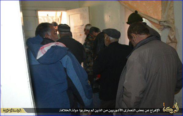 ISIS Assyrian hostages from Tel Goran at an unknown location, prior to their release (photo: social media).