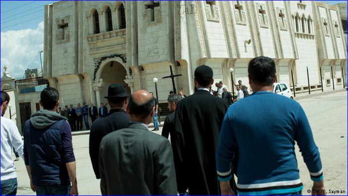 A funeral service in the city of Derek where Kurds are carving out their own territory.