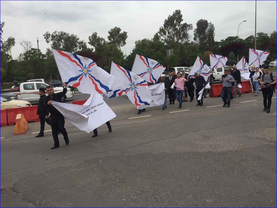 Assyrians in front of the Kurdistan Parliament protest the illegal seizure of Assyrian land in the village of Zoly.
