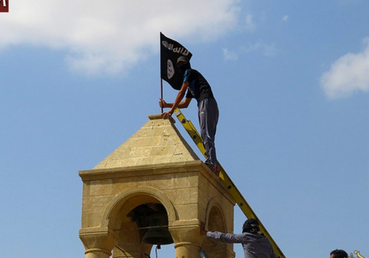 ISIS members destroying the St. George Catholic Monastery in Mosul, Iraq (photo: ISIS twitter).